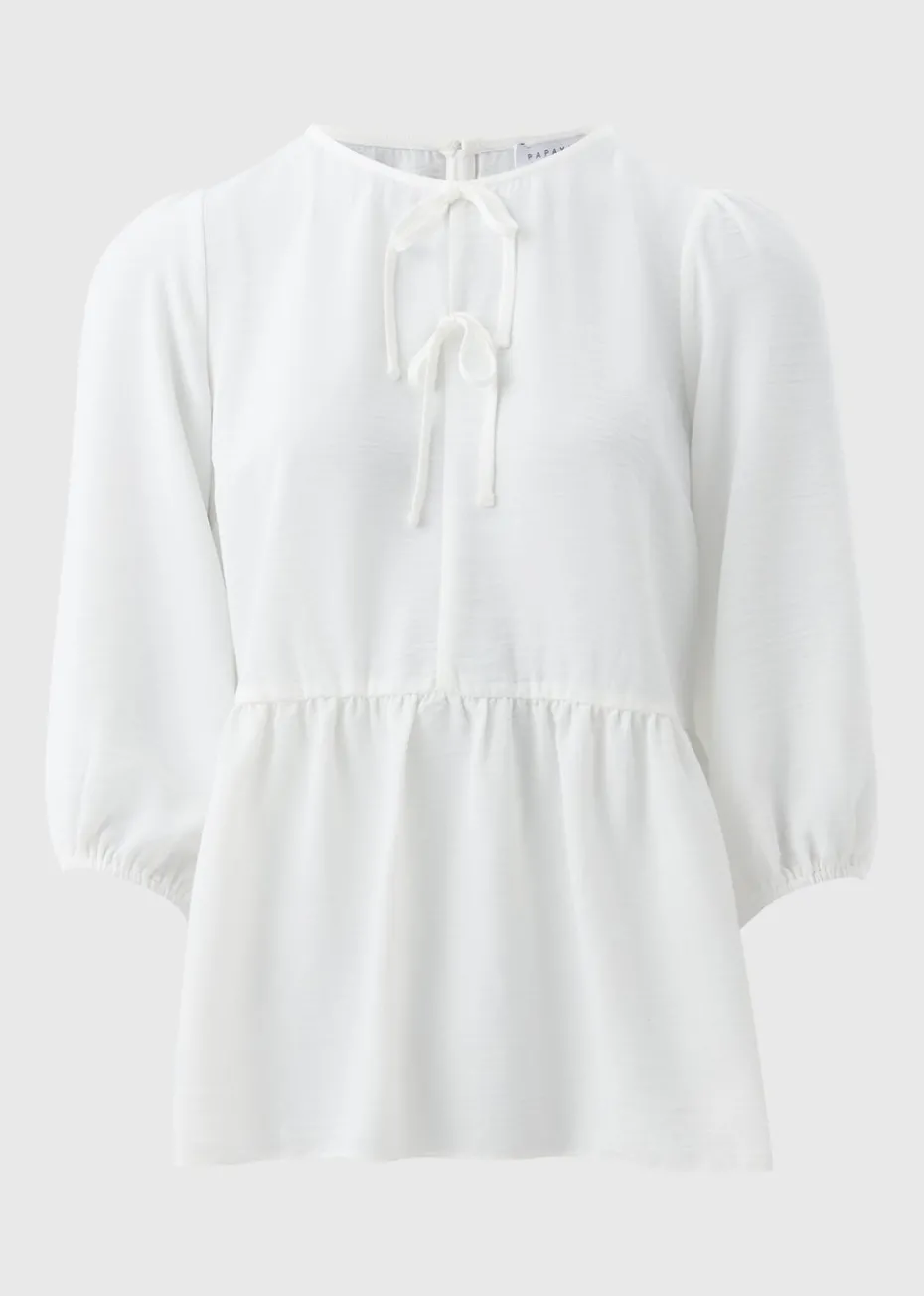 Ivory Tie Neck Peplum Blouse