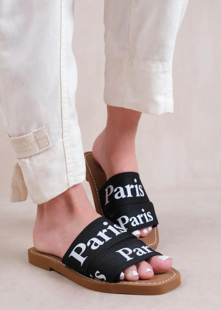 Where's That From Black Pu Cobra Flat Sandals